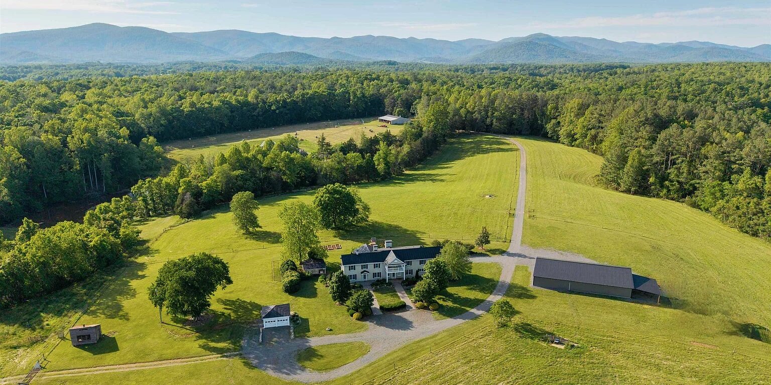 Aerial view of the property with the Blue Ridge beyond